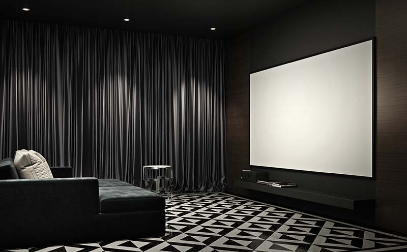 Home cinema with acoustic drapery showing off aesthetics.